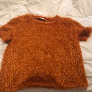 Fuzzy orange shirt